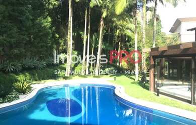 Imagem: A casa em condomínio possui 5 Dormitórios, 5 Banheiros, 4