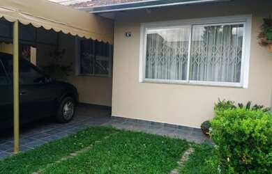 Imagem: A casa possui 2 Dormitórios, 1 Banheiro, 2 Vagas na garagem