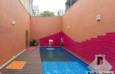 Imagem: A casa possui 3 Dormitórios, 5 Banheiros, 5 Vagas na garagem