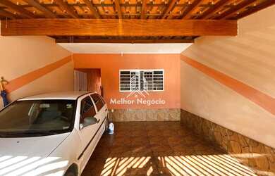 Imagem: A casa possui 3 Dormitórios, 3 Banheiros, 2 Vagas na garagem