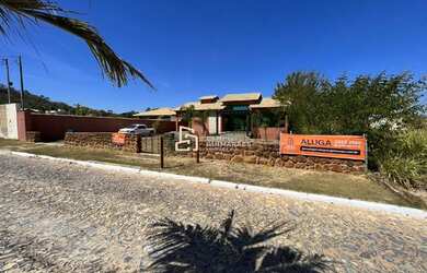 Imagem: A casa possui 3 Dormitórios, 4 Banheiros, 5 Vagas na garagem