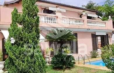 Imagem: A casa possui 5 Dormitórios, 5 Banheiros, 5 Vagas na garagem