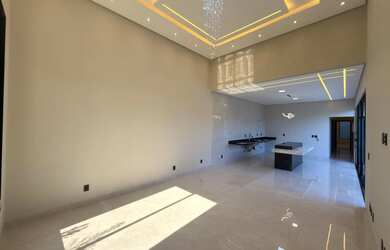 Imagem: A casa possui 4 Dormitórios, 5 Banheiros, 4 Vagas na garagem