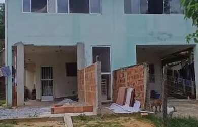 Imagem: A casa possui 2 Dormitórios, 1 Banheiro, 1 Vaga na garagem