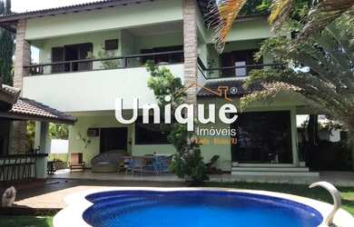 Imagem: A casa possui 4 Dormitórios, 5 Banheiros, 3 Vagas na garagem