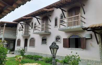 Imagem: A casa possui 5 Dormitórios, 4 Banheiros, 5 Vagas na garagem