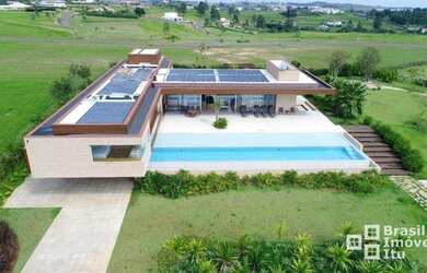 Imagem: A casa em condomínio possui 4 Dormitórios, 5 Banheiros, 4