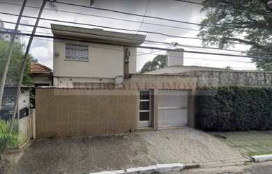 Imagem: A casa possui 3 Dormitórios, 1 Banheiro, 3 Vagas na garagem