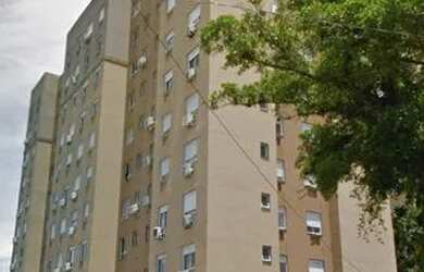 Imagem: O apartamento possui 3 Dormitórios, 1 Banheiro, 1 Vaga na garagem