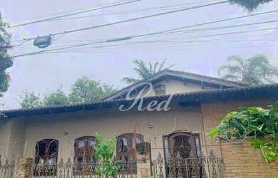 Imagem: A casa possui 3 Dormitórios, 4 Banheiros, 3 Vagas na garagem