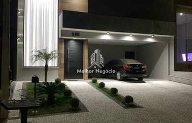 Imagem: A casa possui 4 Dormitórios, 3 Banheiros, 4 Vagas na garagem