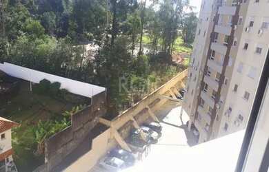 Imagem: O apartamento possui 3 Dormitórios, 1 Banheiro, 1 Vaga na garagem