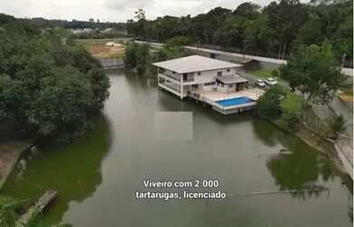 Imagem: A casa possui 5 Dormitórios, 2 Banheiros, 5 Vagas na garagem