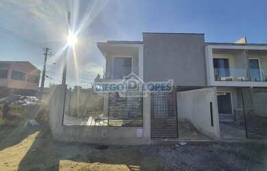 Imagem: A casa possui 3 Dormitórios, 3 Banheiros, 3 Vagas na garagem