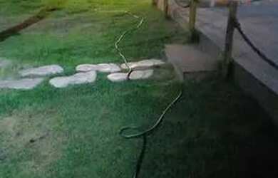 Imagem: A casa possui 3 Dormitórios, 4 Banheiros, 5 Vagas na garagem