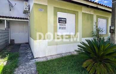 Imagem: A casa em condomínio possui 3 Dormitórios, 2 Banheiros, 1