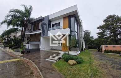 Imagem: A casa à venda possui 3 Dormitórios, 2 Banheiros, 2 Vagas