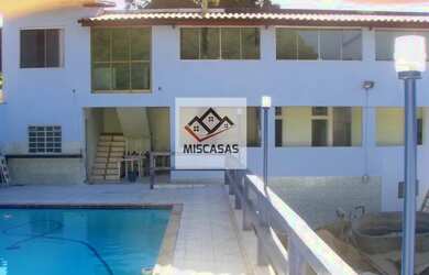 Imagem: A casa possui 5 Dormitórios, 3 Banheiros, 5 Vagas na garagem