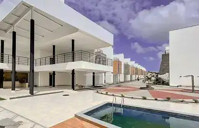 Imagem: A casa em condomínio possui 4 Dormitórios, 5 Banheiros, 2