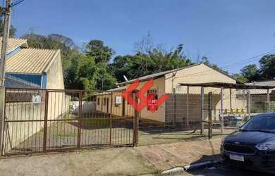 Imagem: A casa possui 2 Dormitórios, 1 Banheiro, 1 Vaga na garagem