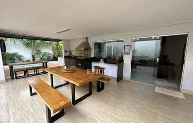 Imagem: A casa possui 3 Dormitórios, 4 Banheiros, 5 Vagas na garagem