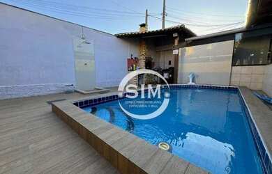Imagem 1: Casa com 5 dormitórios, 300 m² - venda por R$ 880.000,00 ou aluguel por R$ 9.750,00/mês