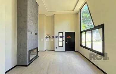 Imagem 5: Casa em Porto Alegre, no bairro Hípica, com 3 dormitório s , e 3 banheiros,...