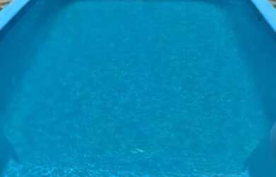 Imagem: A casa em condomínio possui 4 Dormitórios, 4 Banheiros e está