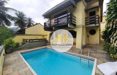 Imagem: A casa em condomínio possui 4 Dormitórios, 5 Banheiros, 4