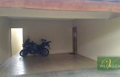 Imagem: A casa possui 3 Dormitórios, 4 Banheiros, 4 Vagas na garagem