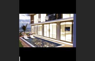 Imagem: A casa possui 4 Dormitórios, 4 Banheiros, 4 Vagas na garagem