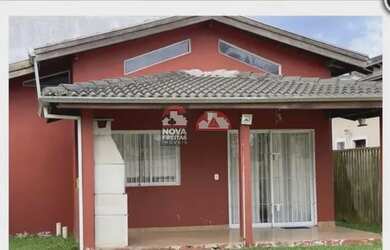 Imagem: A casa possui 3 Dormitórios, 2 Banheiros, 4 Vagas na garagem