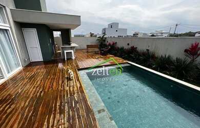 Imagem: A casa em condomínio possui 5 Dormitórios, 5 Banheiros, 4