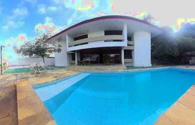 Imagem: A casa possui 5 Dormitórios, 5 Banheiros, 5 Vagas na garagem