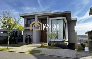 Imagem: A casa possui 5 Dormitórios, 5 Banheiros, 5 Vagas na garagem