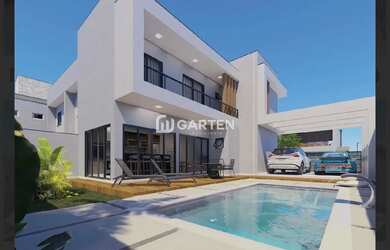 Imagem: A casa possui 3 Dormitórios, 3 Banheiros, 3 Vagas na garagem