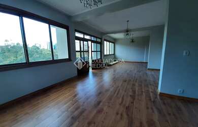 Imagem: O apartamento possui 4 Dormitórios, 2 Banheiros, 2 Vagas na