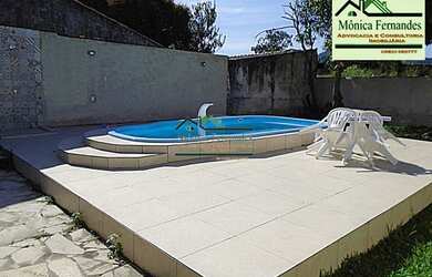 Imagem: A casa possui 3 Dormitórios, 3 Banheiros, 2 Vagas na garagem