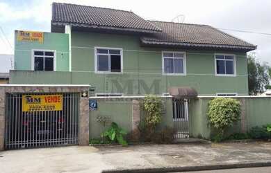 Imagem: A casa possui 3 Dormitórios, 3 Banheiros, 2 Vagas na garagem