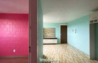 Imagem: O apartamento possui 2 Dormitórios, 1 Banheiro, 1 Vaga na garagem