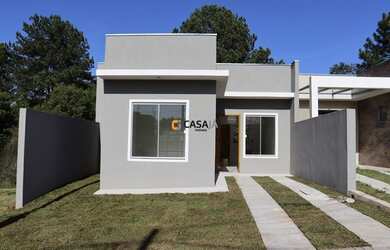 Imagem: A casa possui 3 Dormitórios, 2 Banheiros, 1 Vaga na garagem