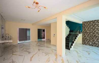 Imagem: A casa possui 5 Dormitórios, 5 Banheiros, 3 Vagas na garagem