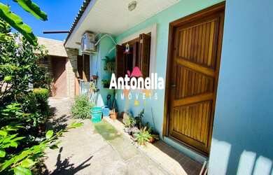 Imagem: A casa possui 2 Dormitórios, 1 Banheiro, 1 Vaga na garagem