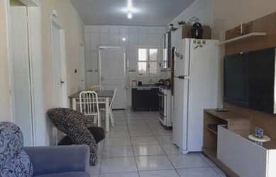 Imagem: A casa possui 2 Dormitórios, 1 Banheiro, 1 Vaga na garagem