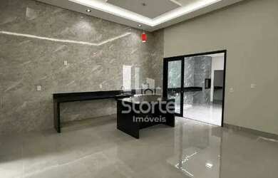 Imagem: A casa possui 3 Dormitórios, 4 Banheiros, 3 Vagas na garagem