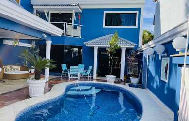 Imagem: A casa em condomínio possui 4 Dormitórios, 4 Banheiros, 5