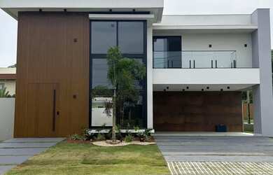 Imagem: A casa em condomínio possui 4 Dormitórios, 5 Banheiros, 2