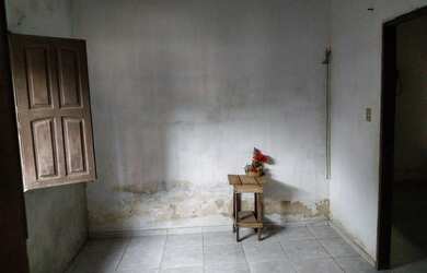 Imagem: A casa possui 2 Dormitórios, 1 Banheiro, 1 Vaga na garagem