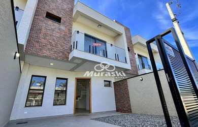 Imagem: A casa possui 3 Dormitórios, 1 Banheiro, 2 Vagas na garagem