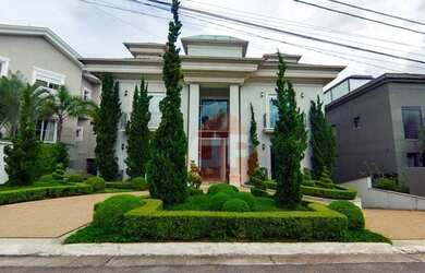 Imagem: A casa em condomínio possui 5 Dormitórios, 5 Banheiros, 5